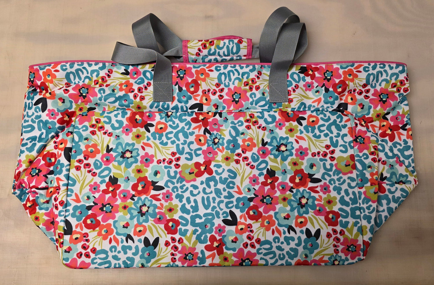 Floral-patterned bag with gray handles