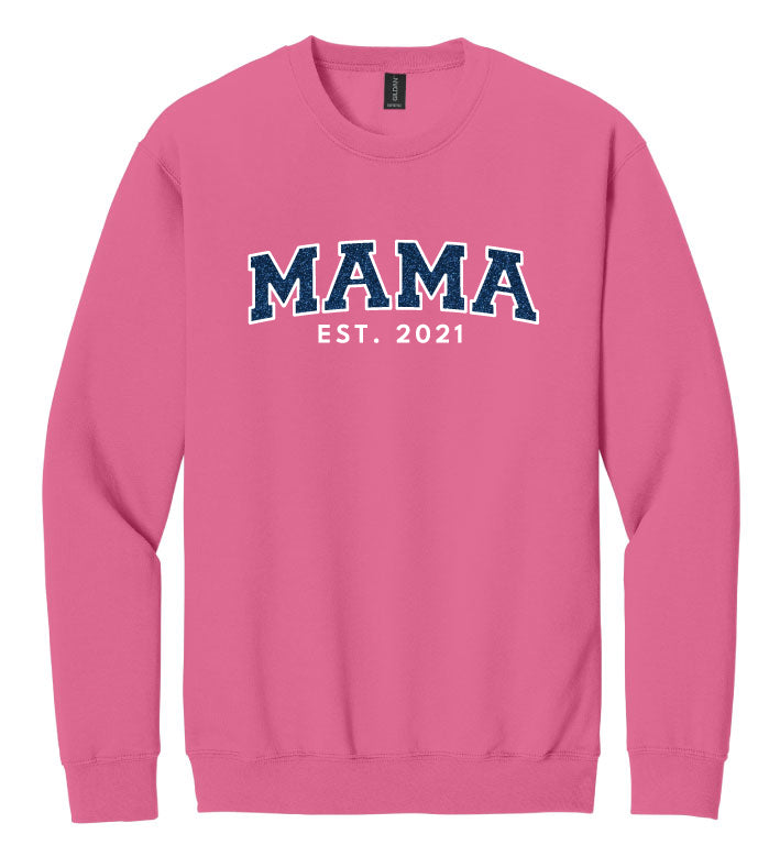 Pink sweatshirt with 'MAMA EST. 2021' text on a white background