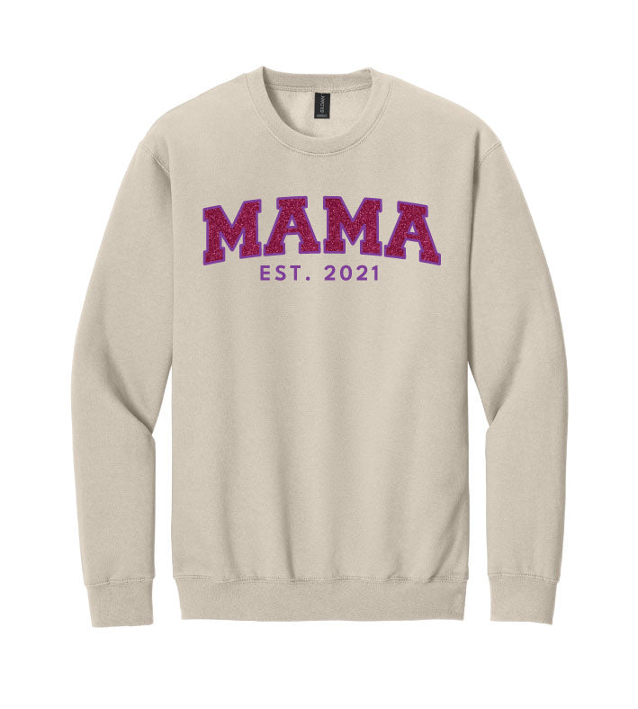 Beige sweatshirt with 'MAMA EST. 2021' text in purple on a white background