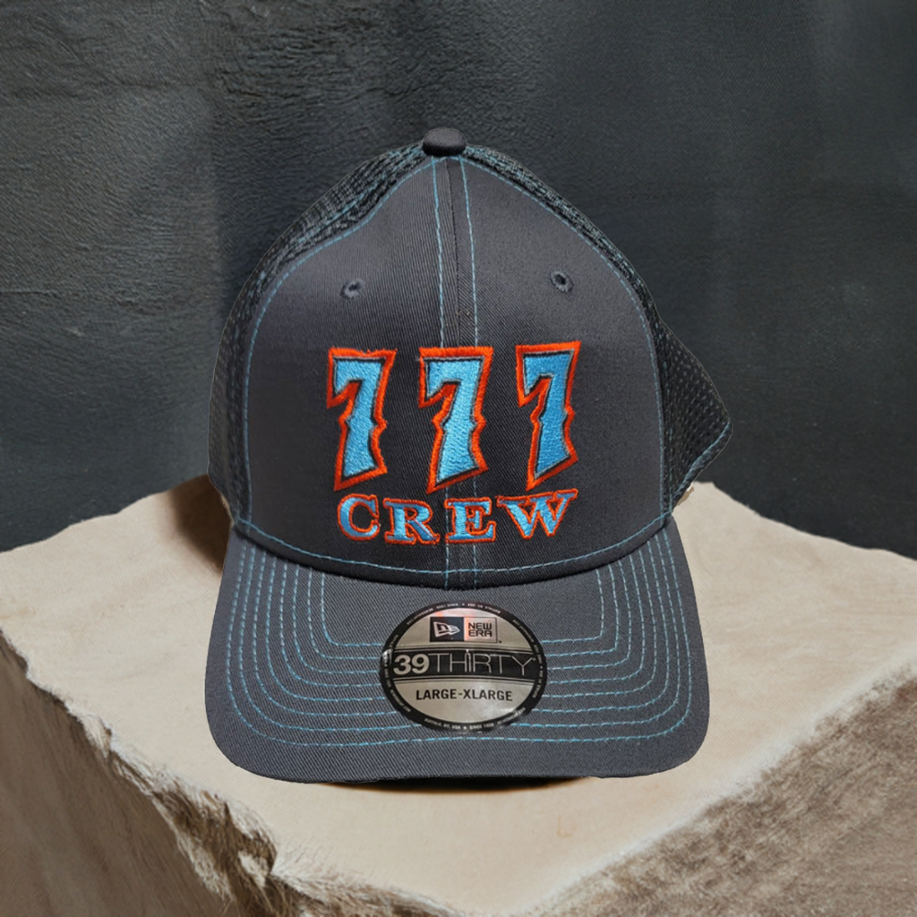 777 crew hat sitting on a rock